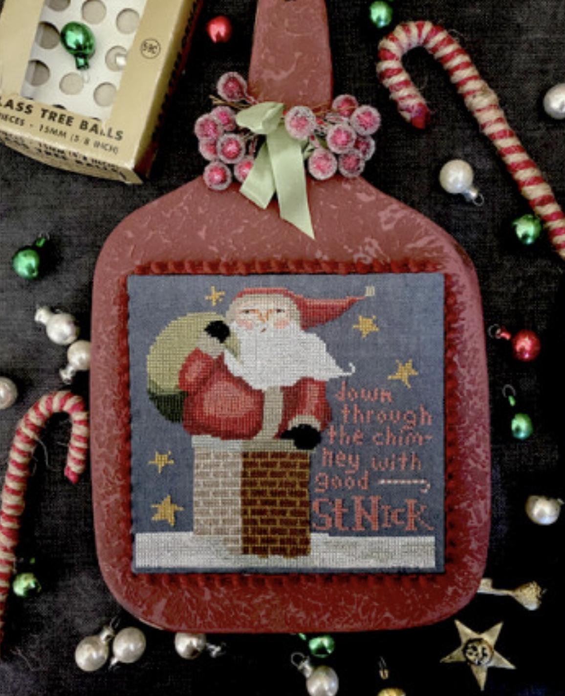 XS316 Stuck Santa Cross Stitch Chart